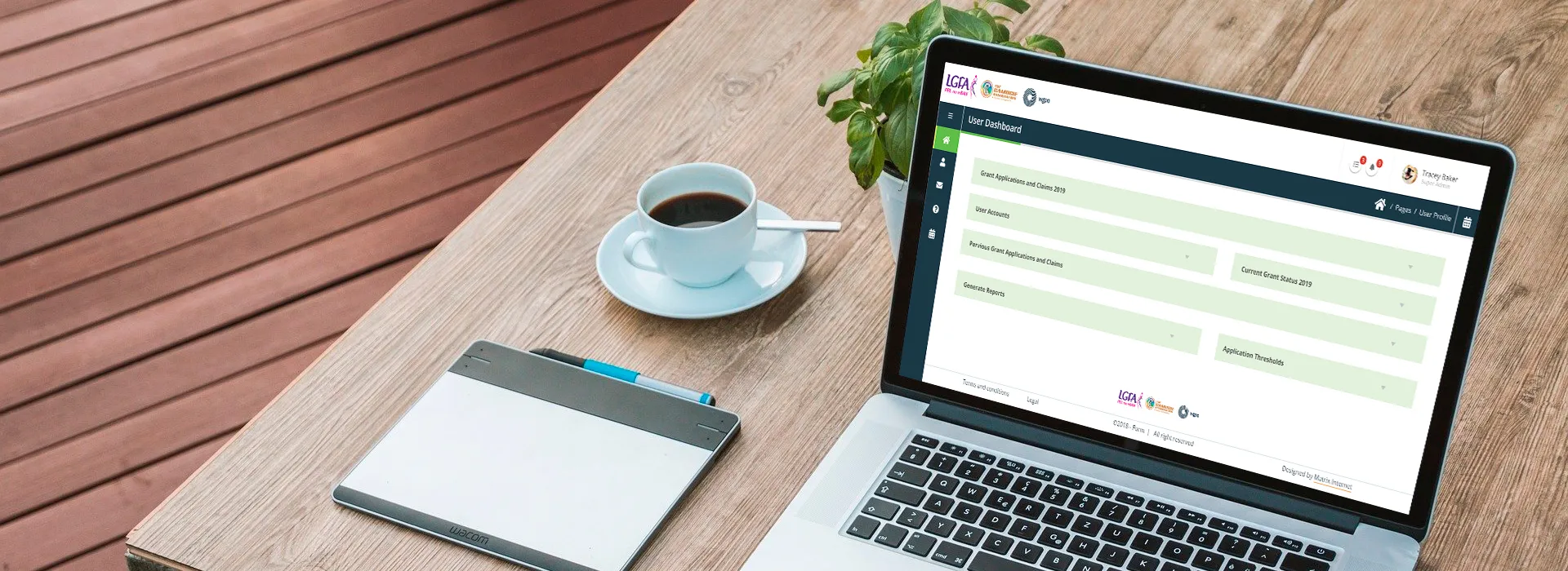 Website on a laptop on a coffee table