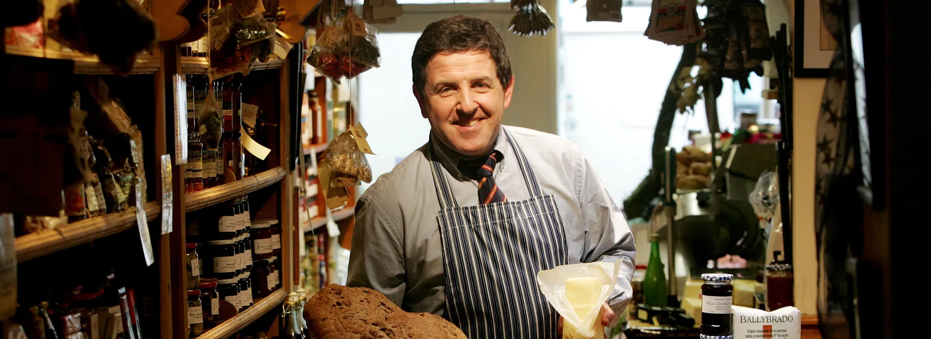Smiling chef holding ingredients