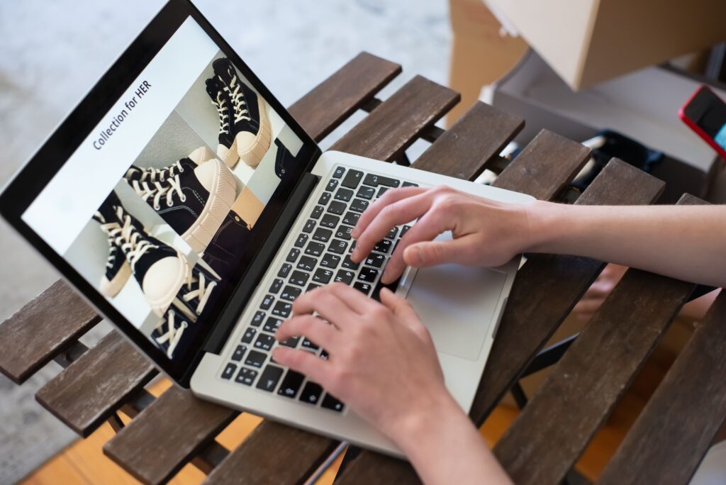 Lost in translation: why speaking the language isn't enough when exporting Matrix Internet Person browsing a footwear collection on a laptop.